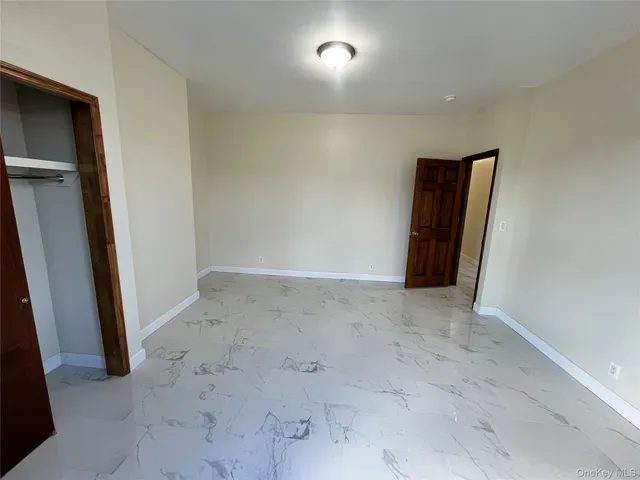 an empty room with closet