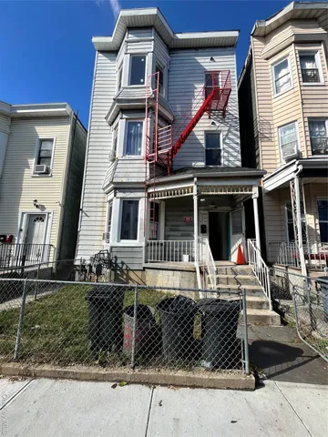 front view of a house with a patio