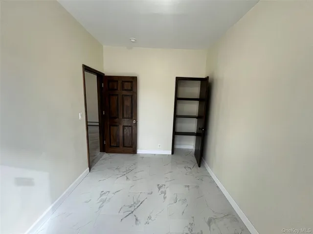 an empty room with closet
