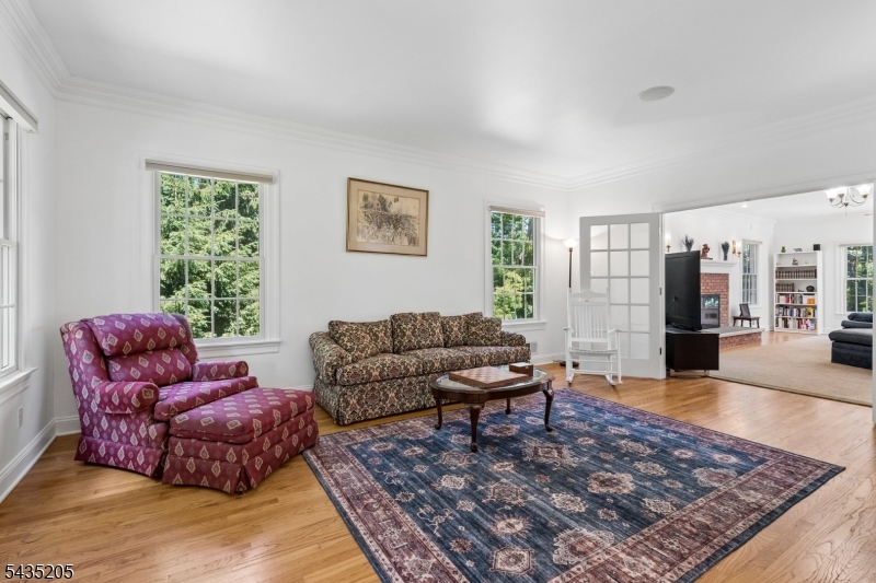 12 Oak Hill Road Bernards, NJ 07920 - Photo 7 of 33 a living room with furniture and a rug