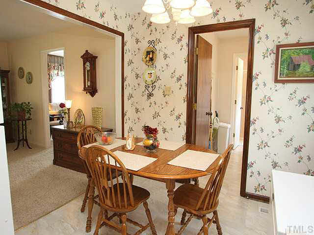 1337 Cole Mill Road Durham, NC 27705 - Photo 10 of 20 Eat in Kitchen, door to living room, laundry room, deck, kitchen Other