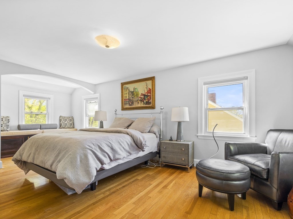 37 Crehore Road Boston, MA 02467 - Photo 12 of 30 a bedroom with a bed and a couch