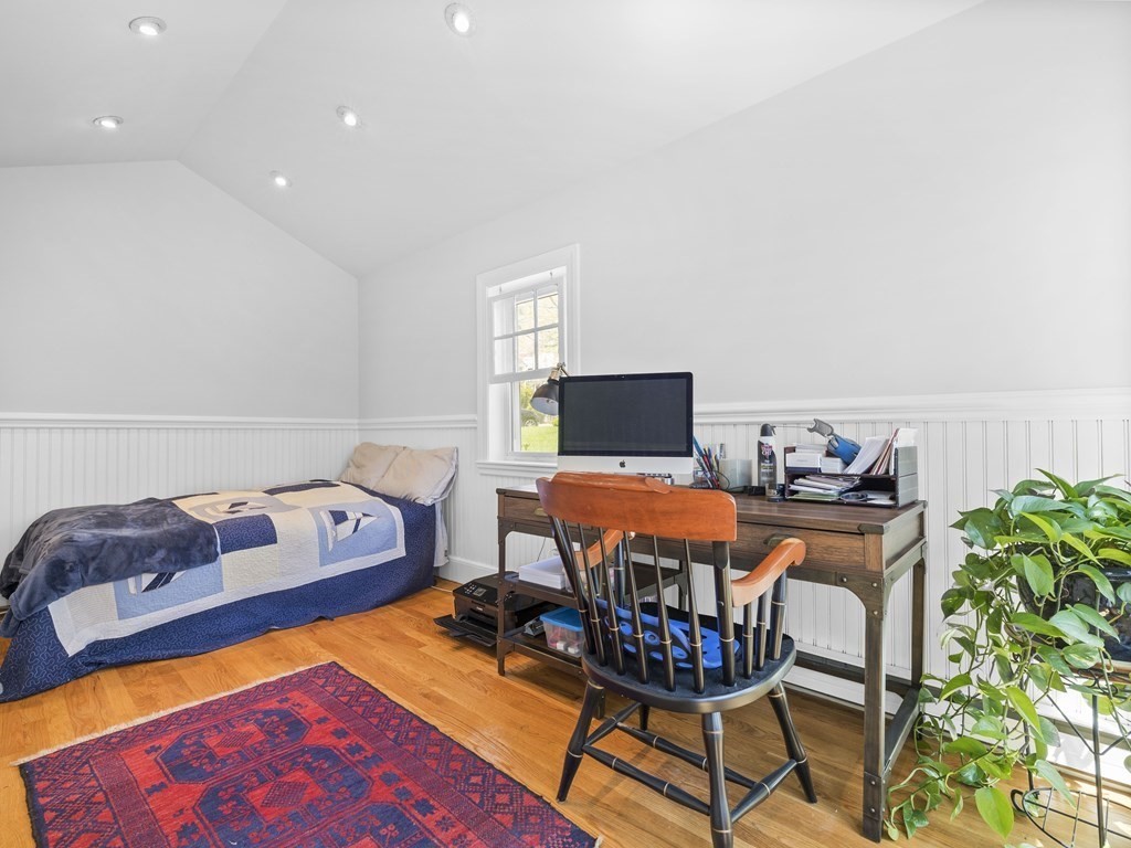 37 Crehore Road Boston, MA 02467 - Photo 15 of 30 a living room with furniture a rug and a lamp