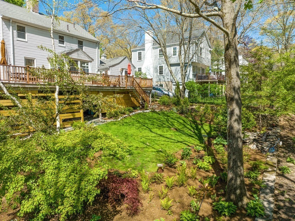37 Crehore Road Boston, MA 02467 - Photo 22 of 30 a view of a building with a yard