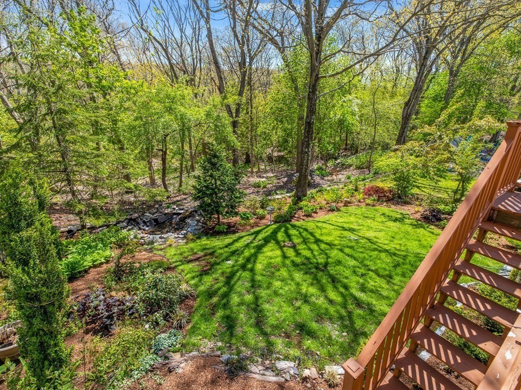 37 Crehore Road Boston, MA 02467 - Photo 23 of 30 a view of a garden from a balcony