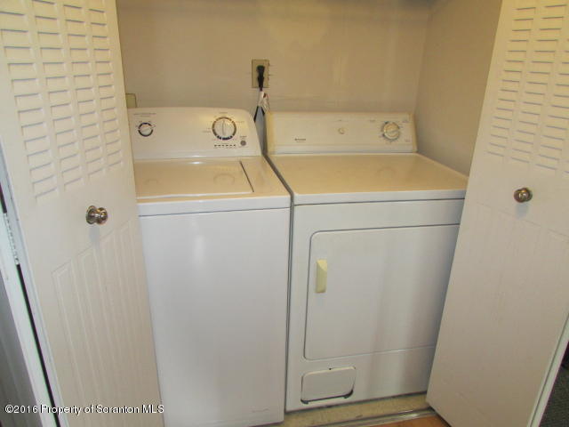 1707 Summit Pointe Scranton, PA 18508 - Photo 13 of 21 a bathroom with a sink and shower