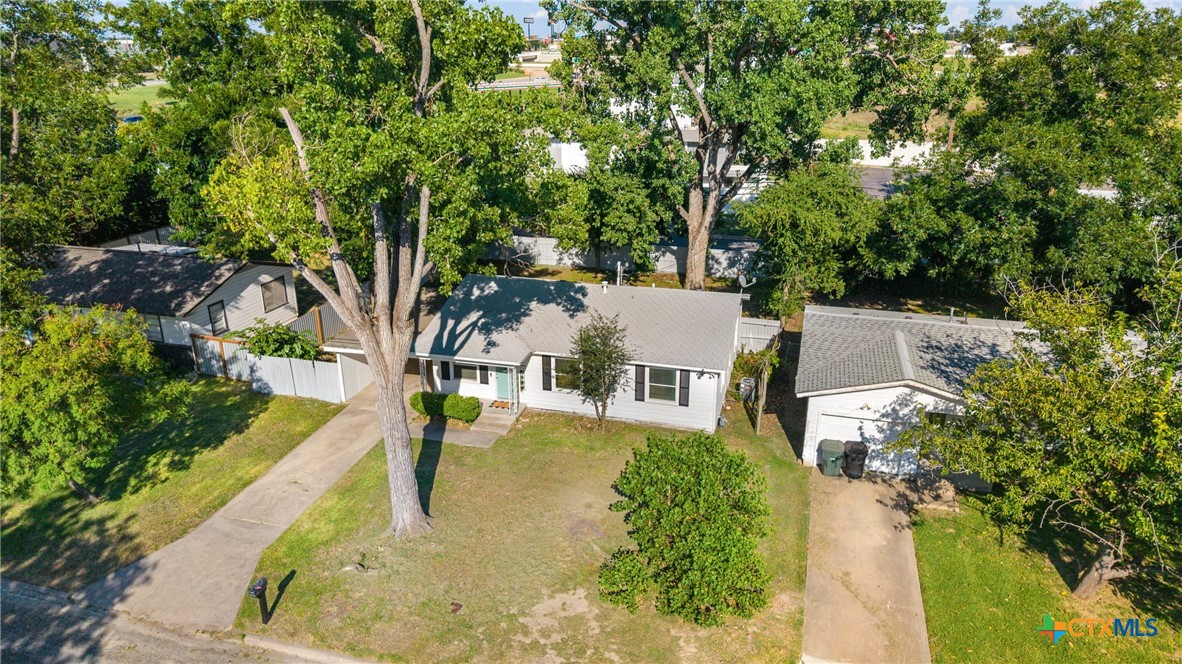 13 North 41st Street Temple, TX 76504 - Photo 18 of 20 an aerial view of a house with swimming pool and large trees