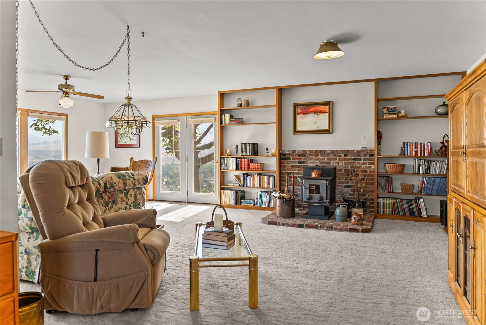 14 Dalton Road Omak, WA 98841 - Photo 15 of 37 a living room with furniture a ceiling fan and a window
