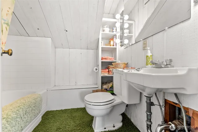 a view of front of house with a yard