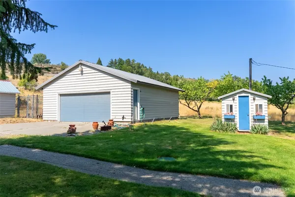 a view of a house with wooden floor and a tub