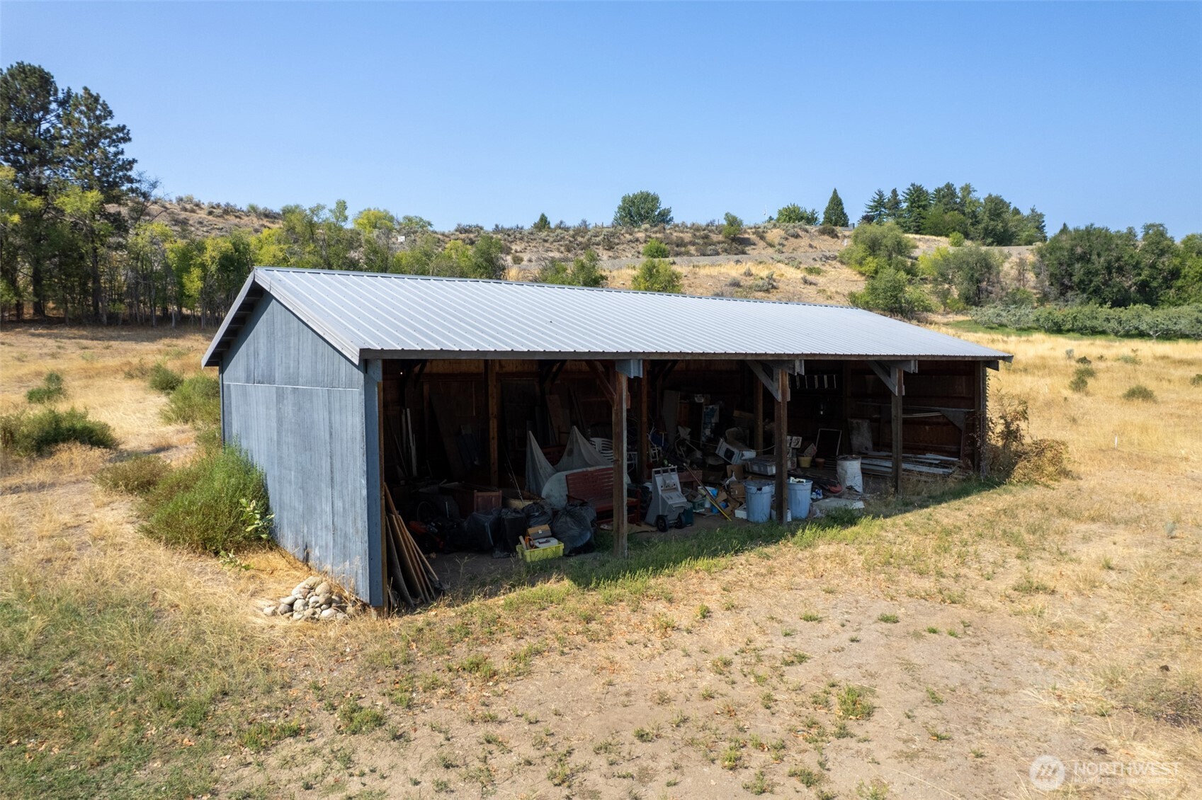 14 Dalton Road Omak, WA 98841 - Photo 32 of 37 a view of a house with wooden floor and a tub