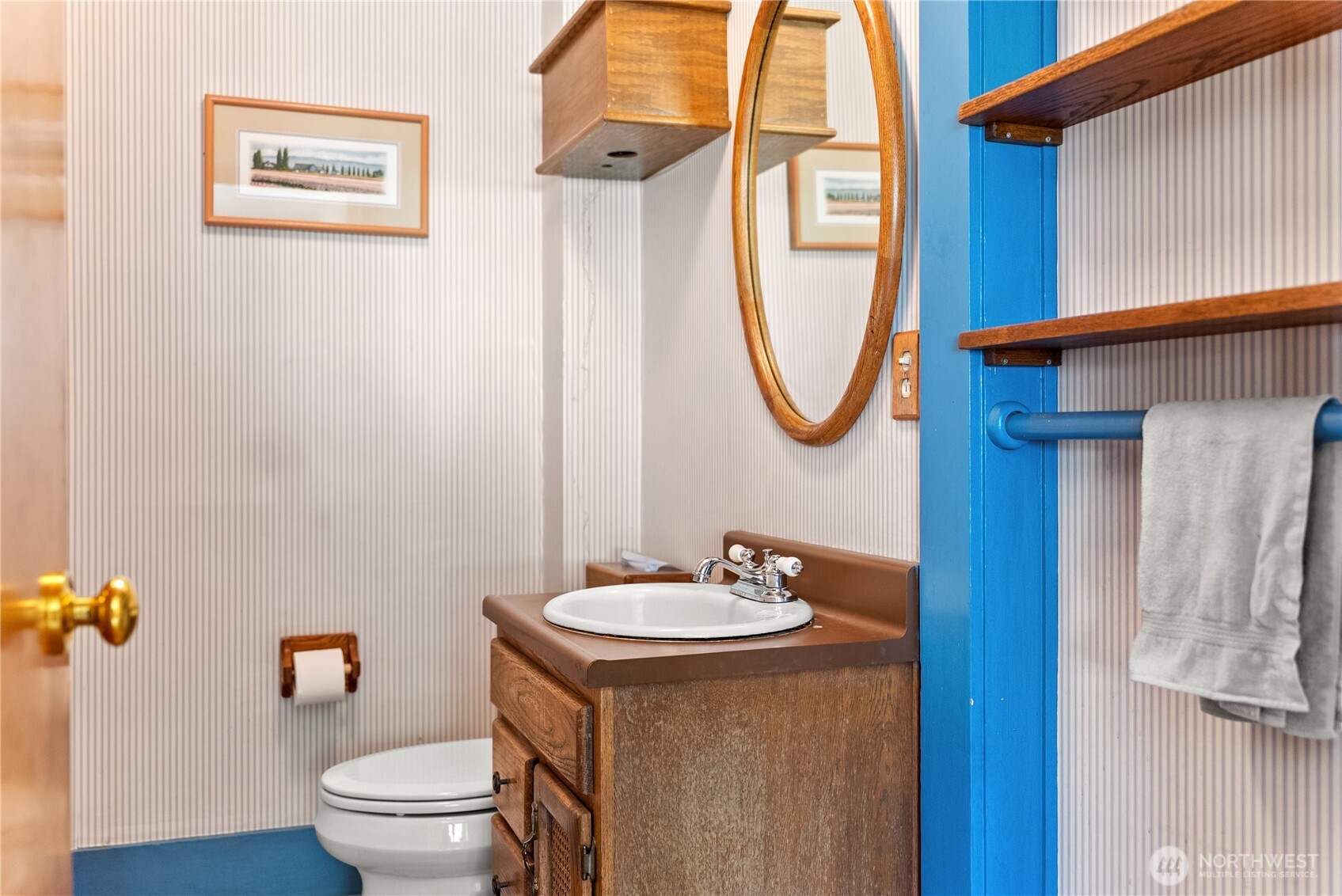 14 Dalton Road Omak, WA 98841 - Photo 10 of 37 a bathroom with a toilet a sink and mirror