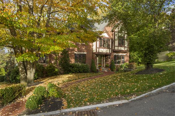 22 Chestnut Hill Road Newton, MA 02467 - Photo 1 of 30 a front view of a house with a yard