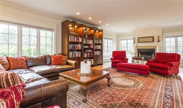 22 Chestnut Hill Road Newton, MA 02467 - Photo 11 of 30 a living room with furniture fireplace and a window