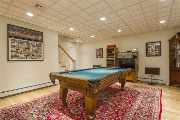 22 Chestnut Hill Road Newton, MA 02467 - Photo 23 of 30 a living room with furniture pool table and a table