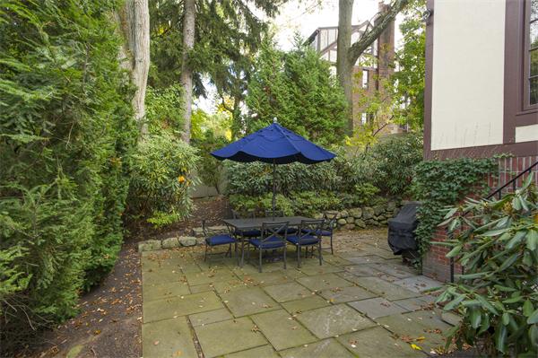22 Chestnut Hill Road Newton, MA 02467 - Photo 28 of 30 a view of a backyard with furniture and a yard