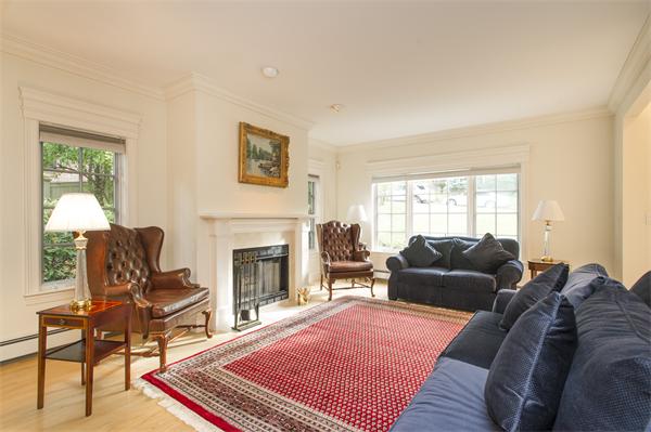 22 Chestnut Hill Road Newton, MA 02467 - Photo 5 of 30 a living room with furniture fireplace and window
