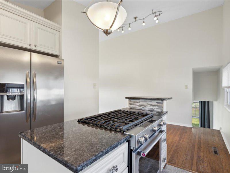 437 Haywood Road Ambler, PA 19002 - Photo 3 of 14 a kitchen with kitchen island a counter space a sink appliances and cabinets