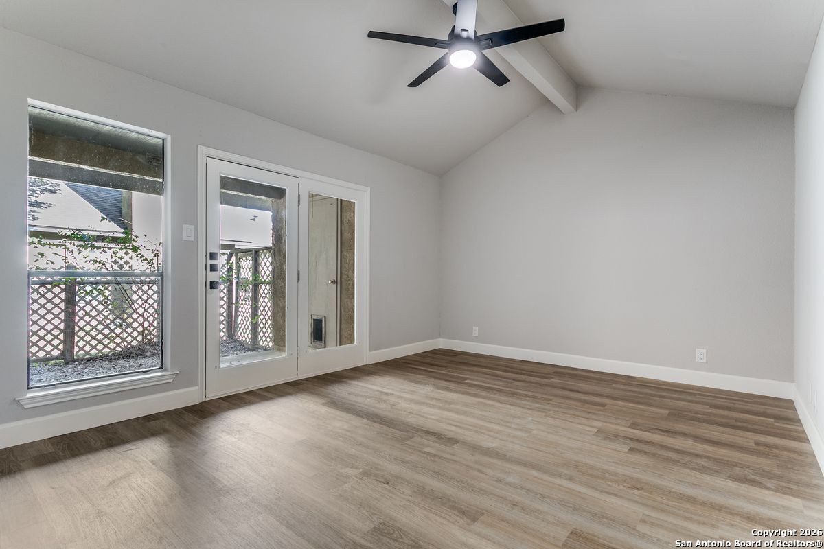 9380 Braun Road, Unit 501B San Antonio, TX 78254 - Photo 17 of 29 a view of an empty room with glass door