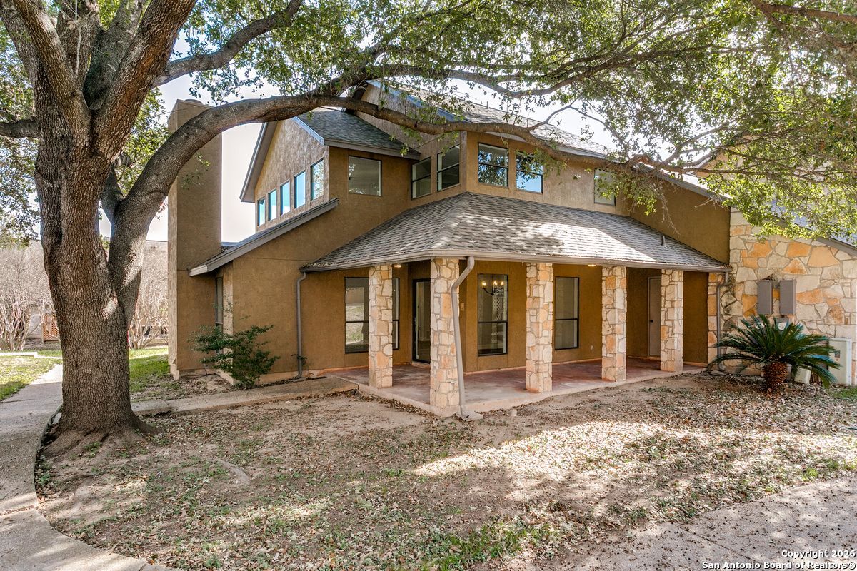 9380 Braun Road, Unit 501B San Antonio, TX 78254 - Photo 27 of 29 a front view of a house with garden