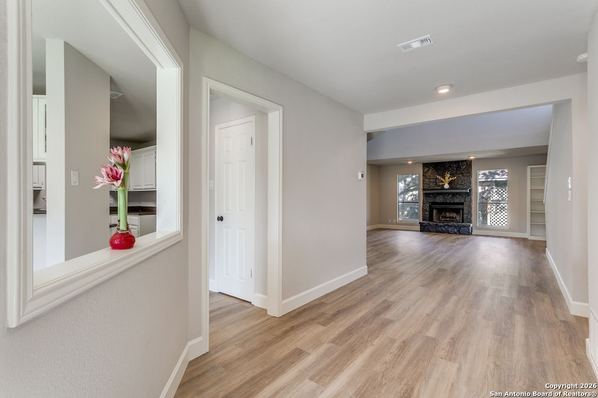 9380 Braun Road, Unit 501B San Antonio, TX 78254 - Photo 10 of 29 wooden floor in an empty room