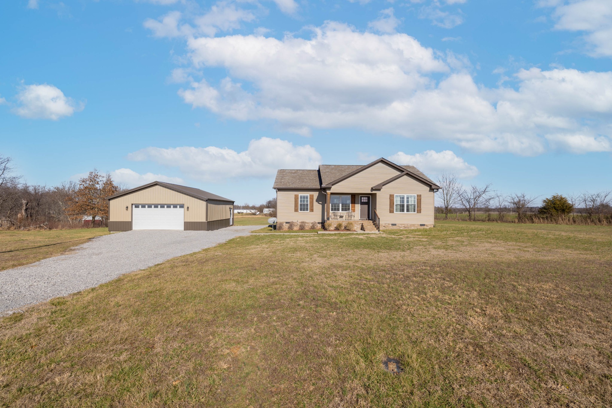 950 White Road Portland, TN 37148 - Photo 1 of 35 a view of a house with a yard and large trees