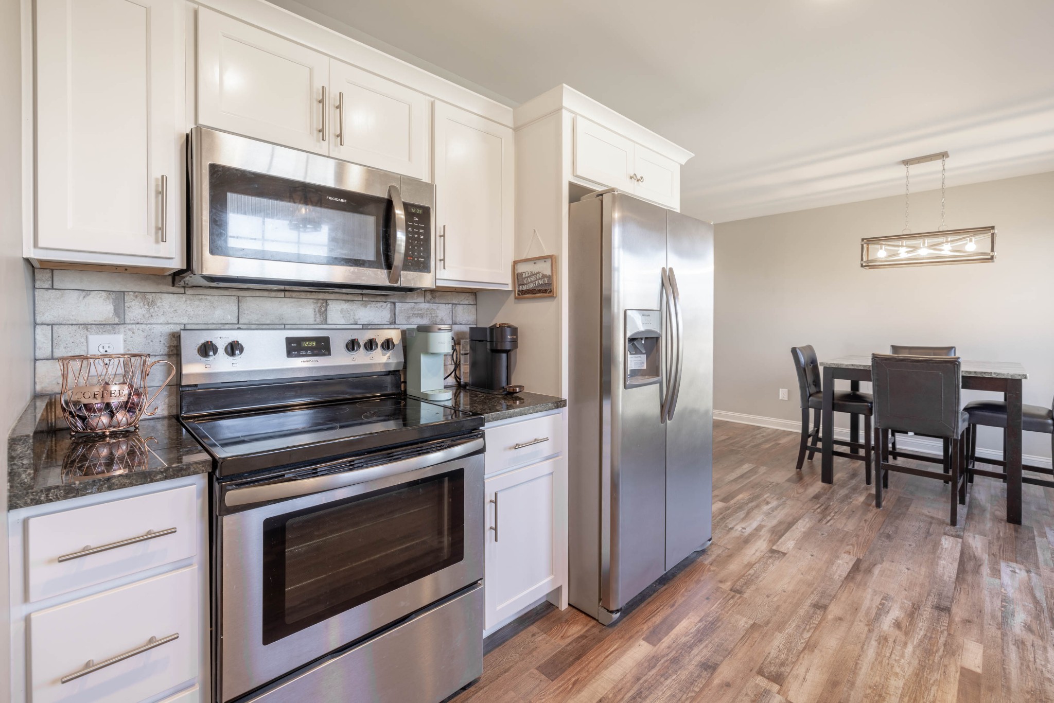950 White Road Portland, TN 37148 - Photo 15 of 35 a kitchen with a stove and a microwave