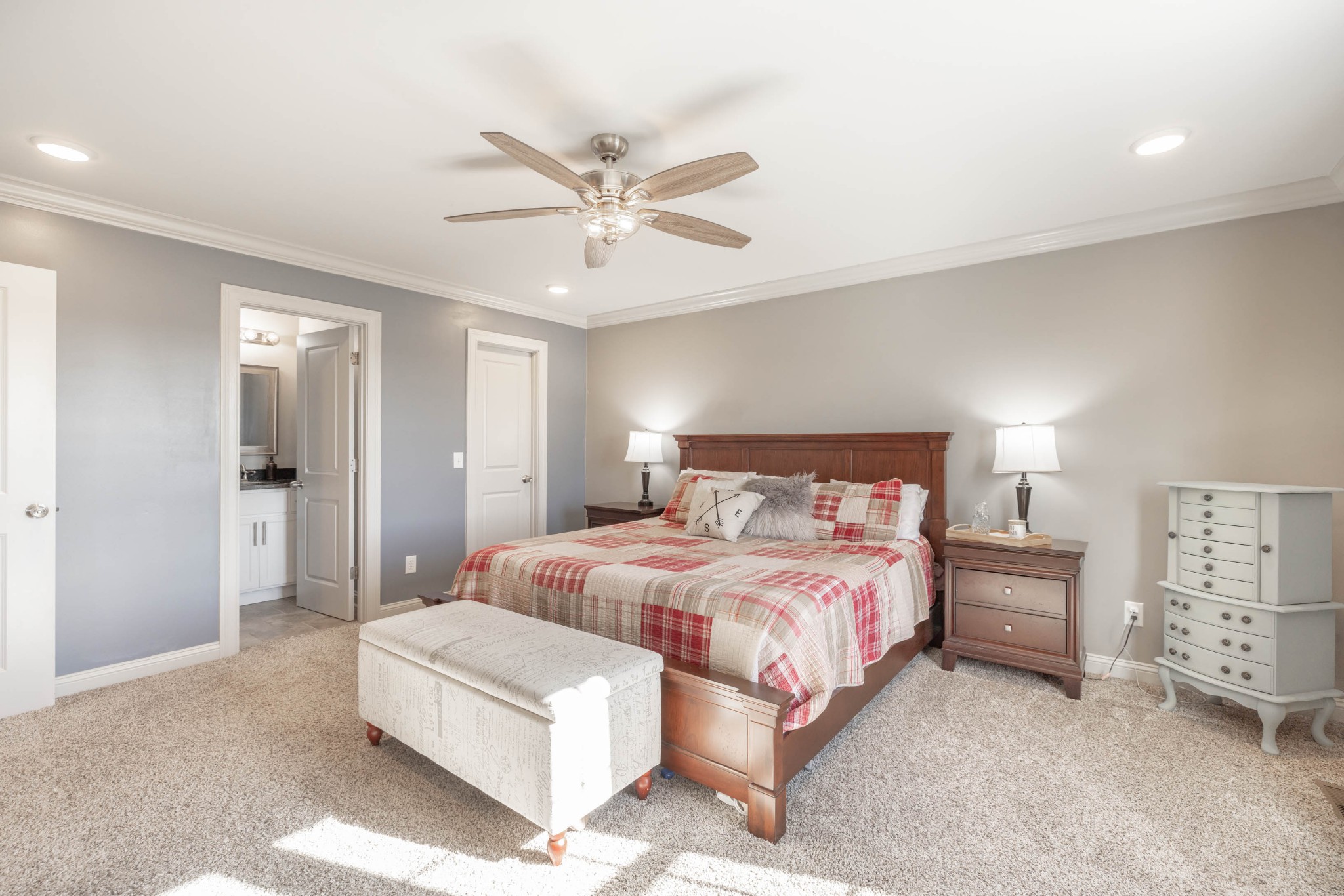 950 White Road Portland, TN 37148 - Photo 20 of 35 a bedroom with a bed and a chandelier