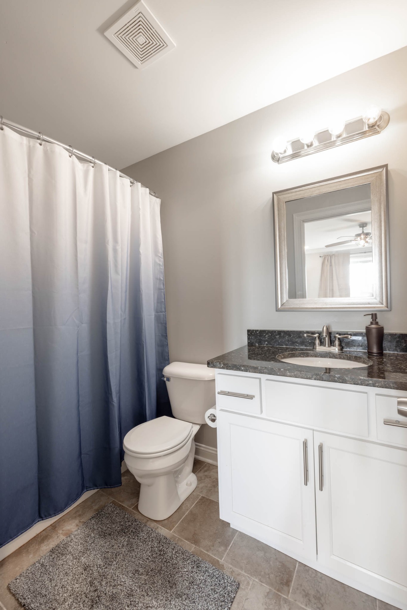 950 White Road Portland, TN 37148 - Photo 23 of 35 a bathroom with a granite countertop sink vanity mirror and toilet