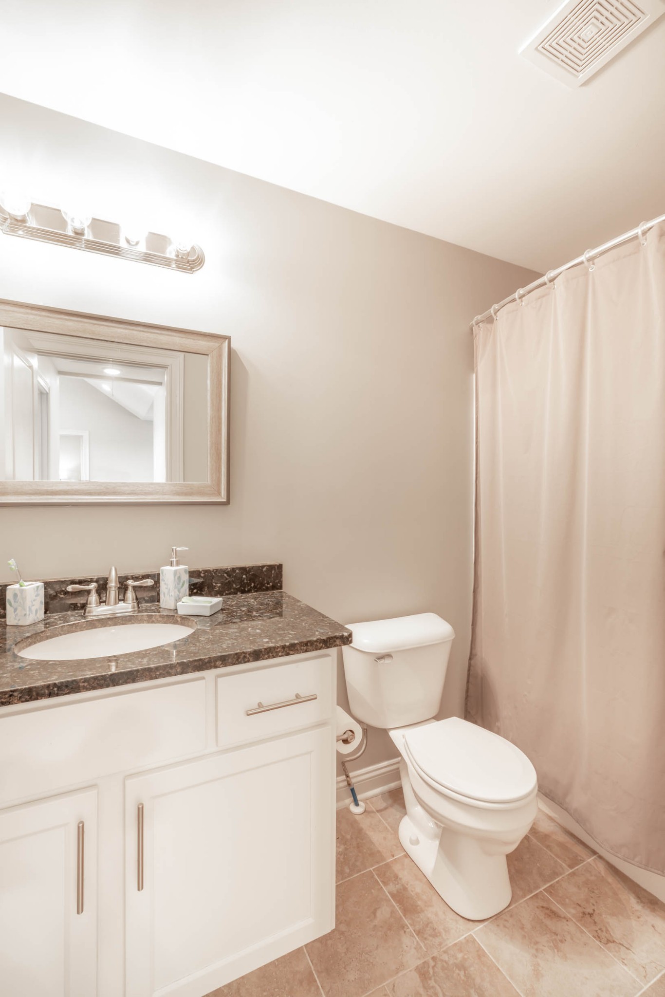 950 White Road Portland, TN 37148 - Photo 30 of 35 a bathroom with a granite countertop toilet sink mirror and vanity