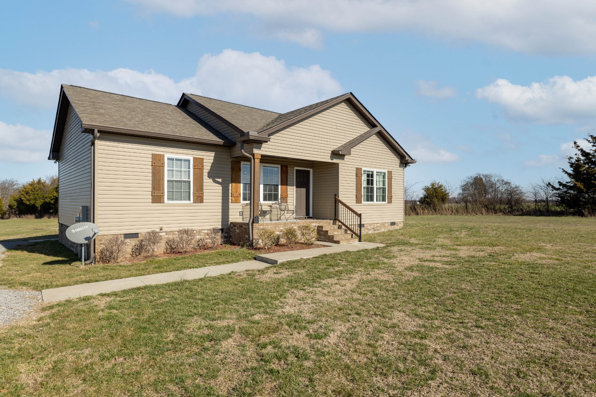 950 White Road Portland, TN 37148 - Photo 3 of 35 a view of a house with backyard and sitting area