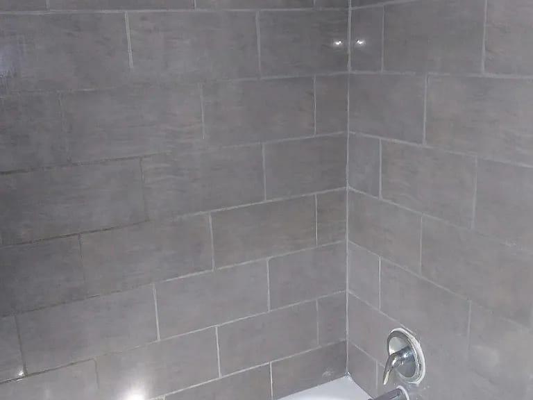 3419 Carter Lane Chester, PA 19013 - Photo 35 of 52 Studio-Sleek, modern bathroom with elegant tiles.