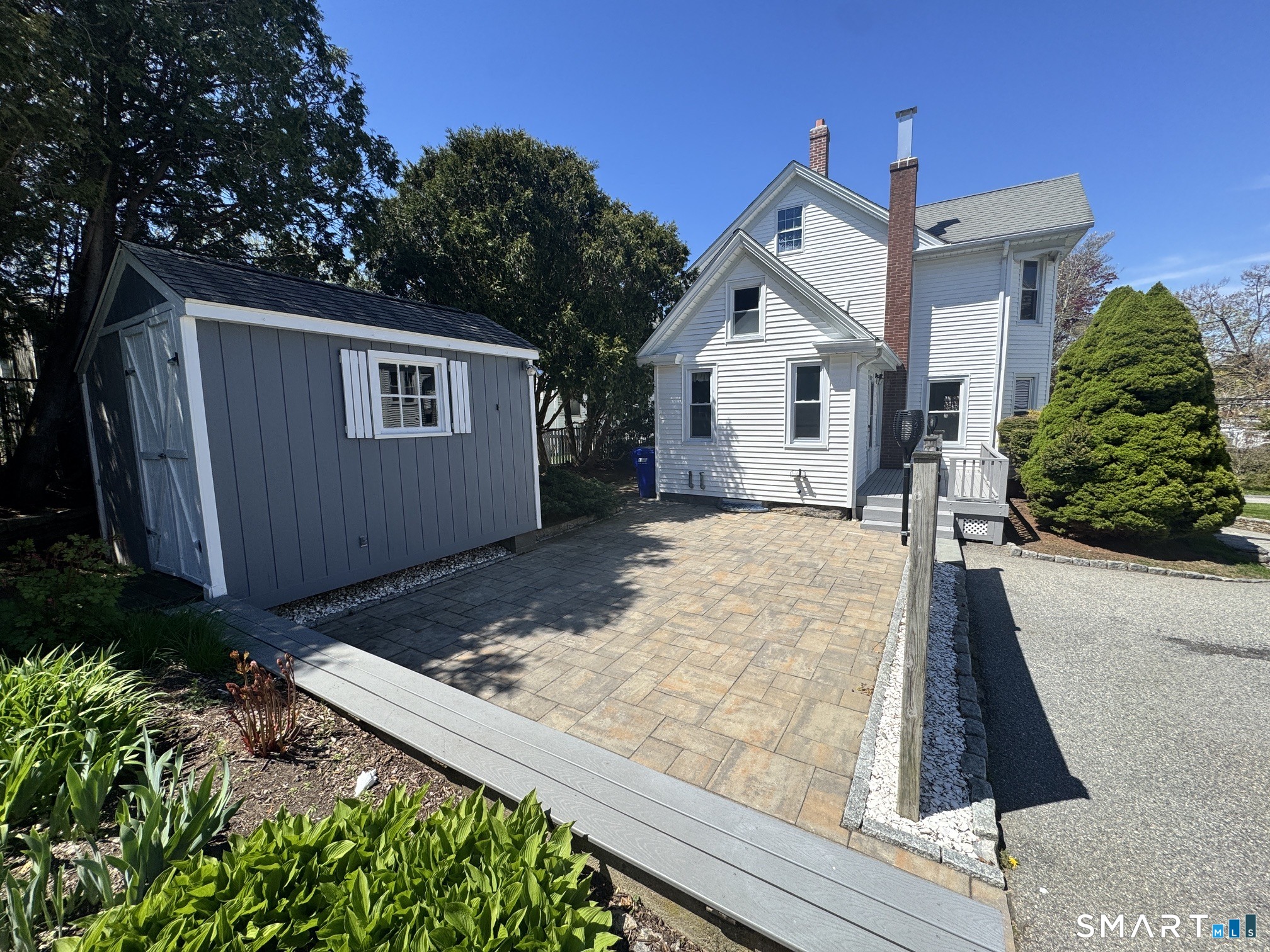 17 High Street Groton, CT 06340 - Photo 8 of 37 a view of a house with a yard