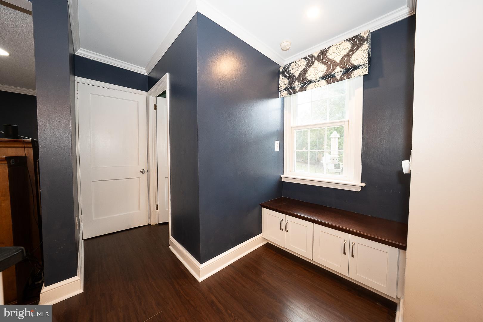 802 Pleasant Hill Road Wallingford, PA 19086 - Photo 21 of 44 a bathroom with a double vanity sink and mirror