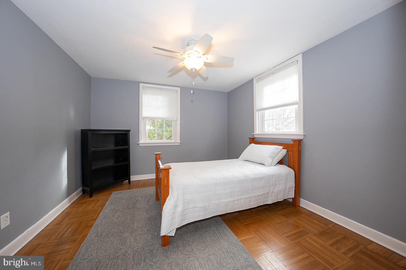 802 Pleasant Hill Road Wallingford, PA 19086 - Photo 31 of 44 a bedroom with a bed and a television