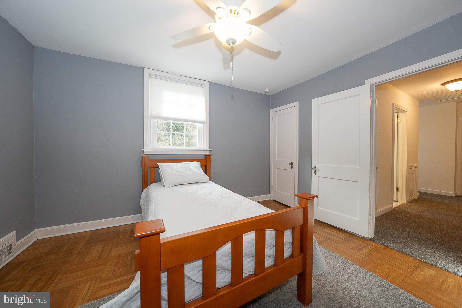 802 Pleasant Hill Road Wallingford, PA 19086 - Photo 32 of 44 a bedroom with a bed and a window