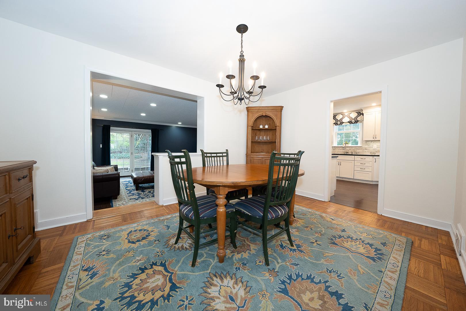 802 Pleasant Hill Road Wallingford, PA 19086 - Photo 10 of 44 a view of a dining room with furniture and wooden floor