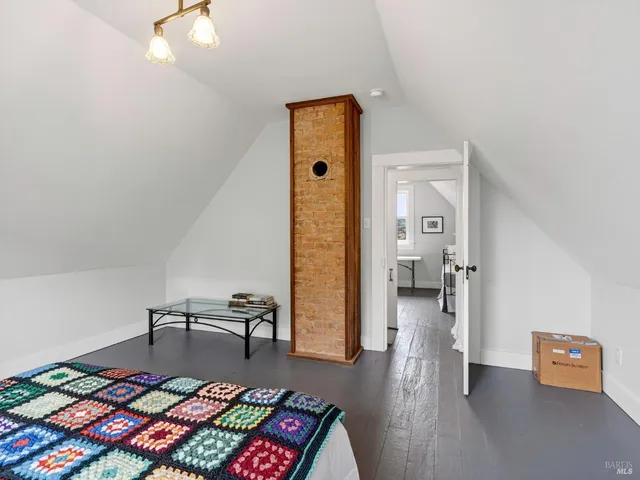 a room with window and couch