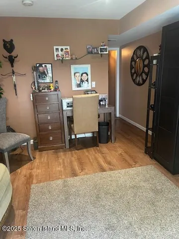 a view of a workspace with furniture