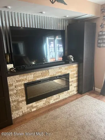 a living room with a fireplace