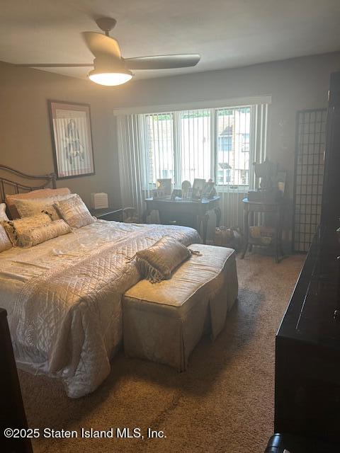 45 Daffodil Court Staten Island, NY 10312 - Photo 24 of 37 a bedroom with a bed and a window