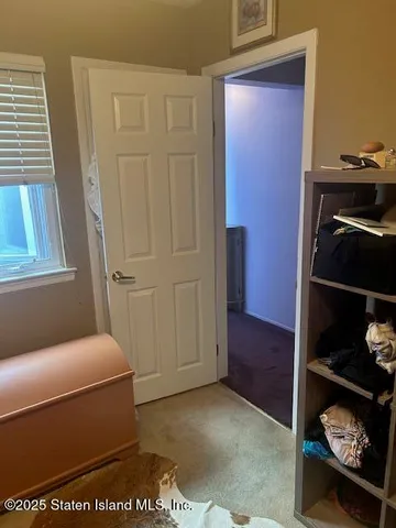 a room with a couch and a stove