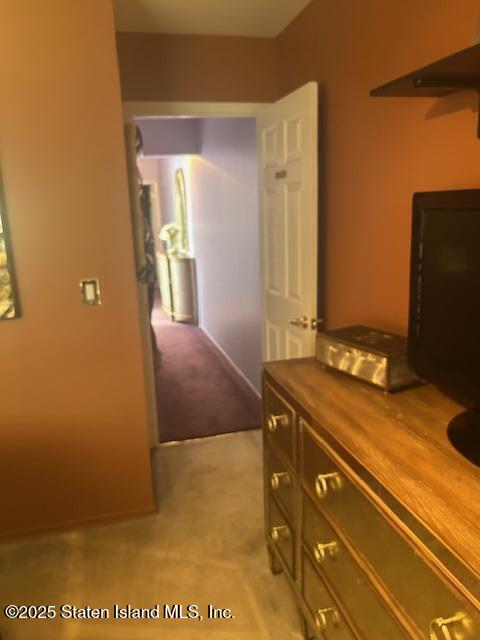 45 Daffodil Court Staten Island, NY 10312 - Photo 30 of 37 a bathroom with a sink and a mirror