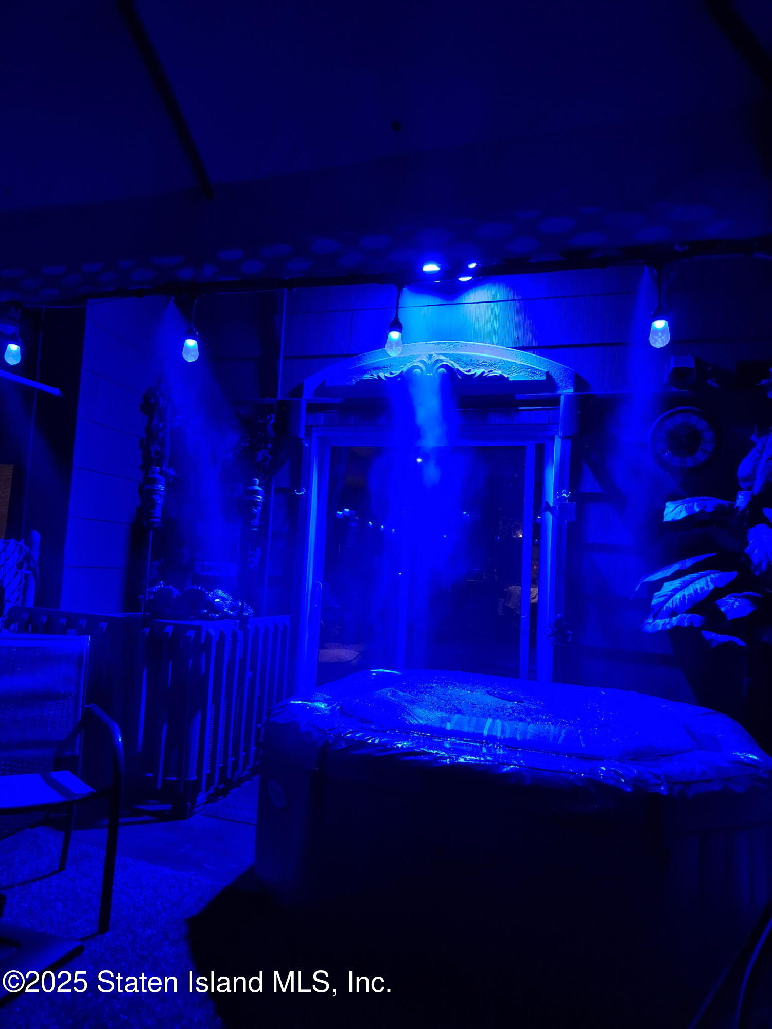 45 Daffodil Court Staten Island, NY 10312 - Photo 31 of 37 a view of a room with red walls and a yard