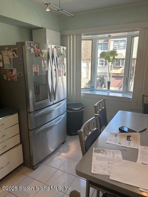 45 Daffodil Court Staten Island, NY 10312 - Photo 5 of 37 a kitchen with a refrigerator and windows