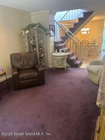 a living room with furniture and a couch