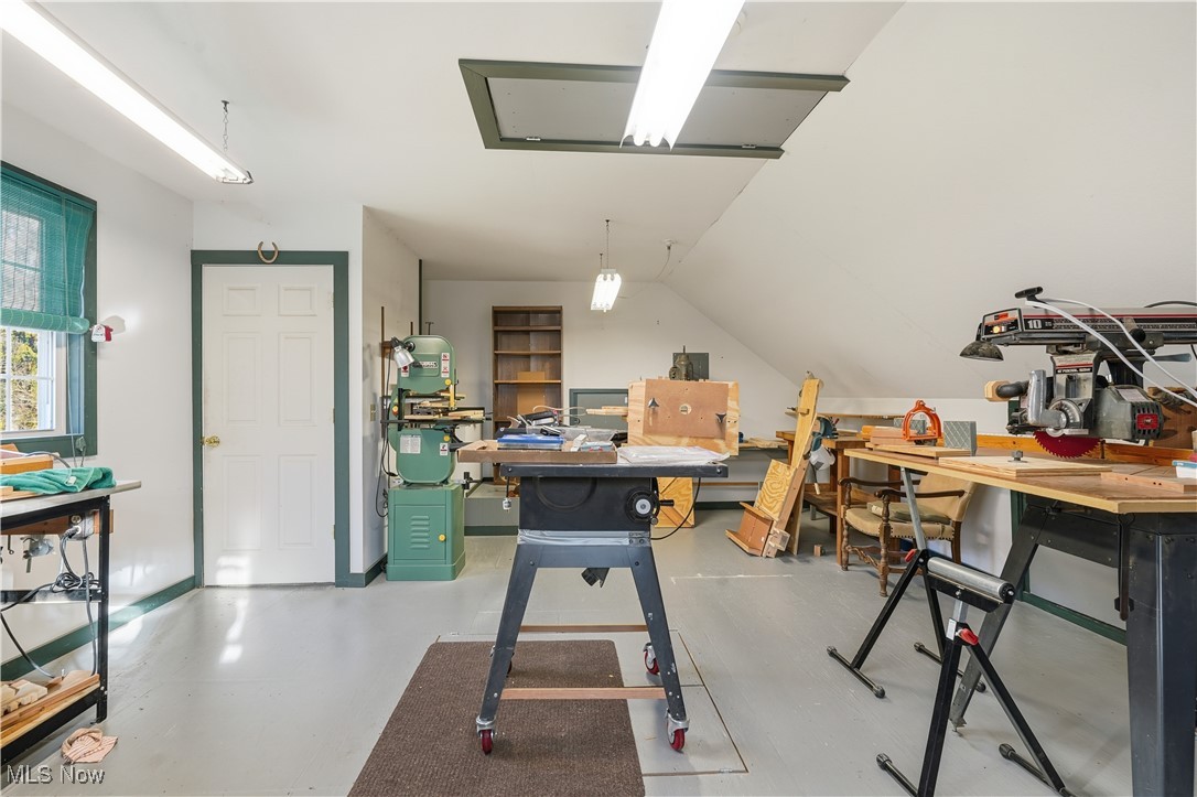 3275 Ranfield Road Kent, OH 44240 - Photo 27 of 33 Office space featuring a workshop area, vaulted ceiling, and finished concrete floors