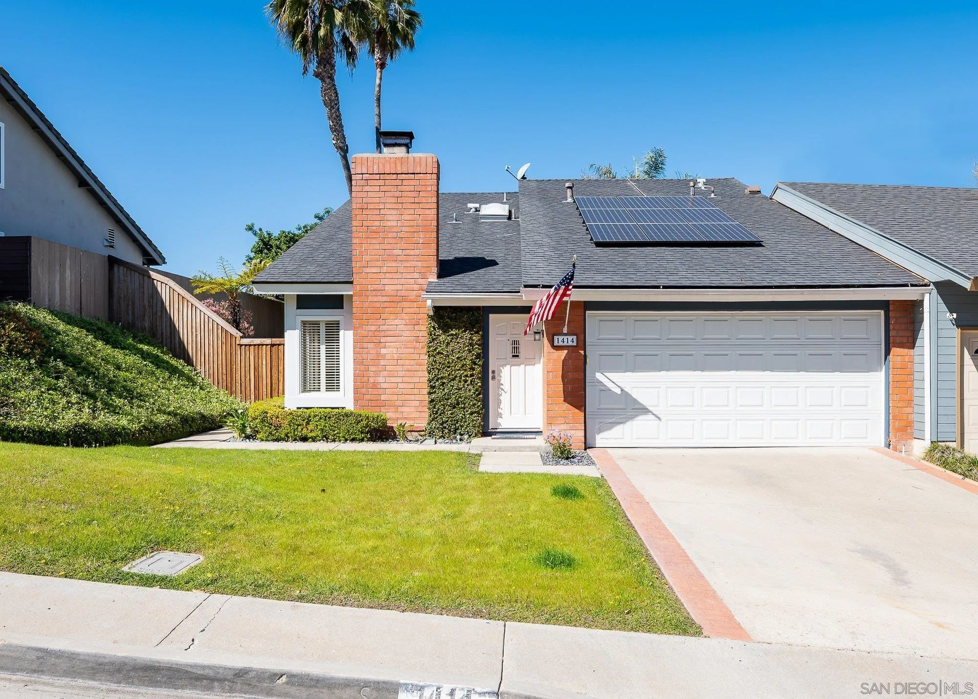 a view of house with yard