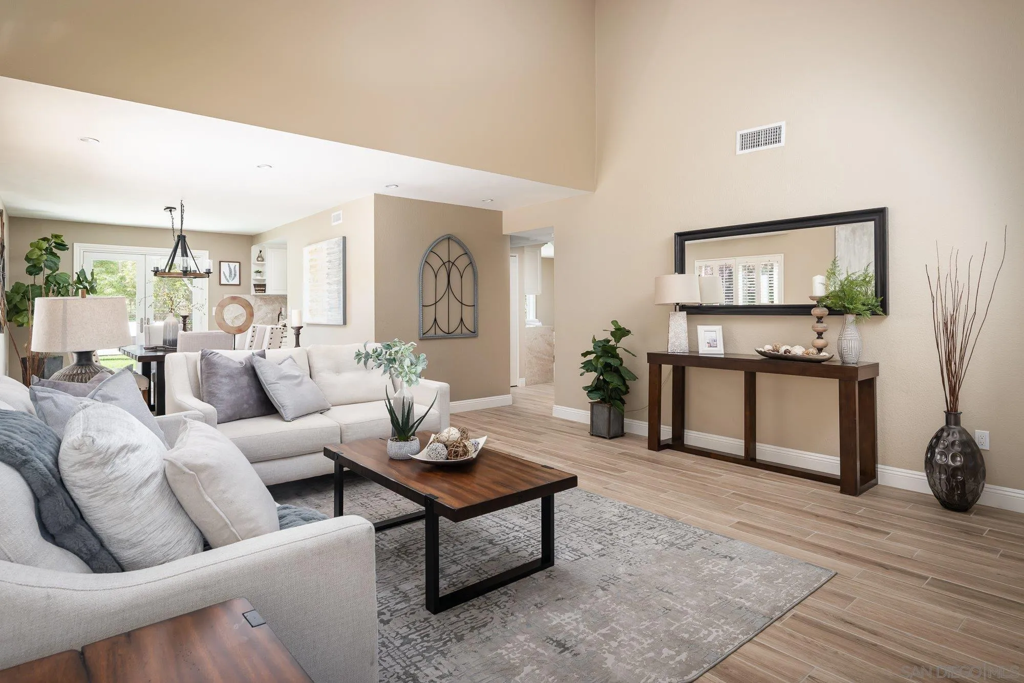 1414 Flair Encinitas Drive Encinitas, CA 92024 - Photo 6 of 41 a living room with furniture and wooden floor