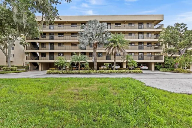 a view of building with yard